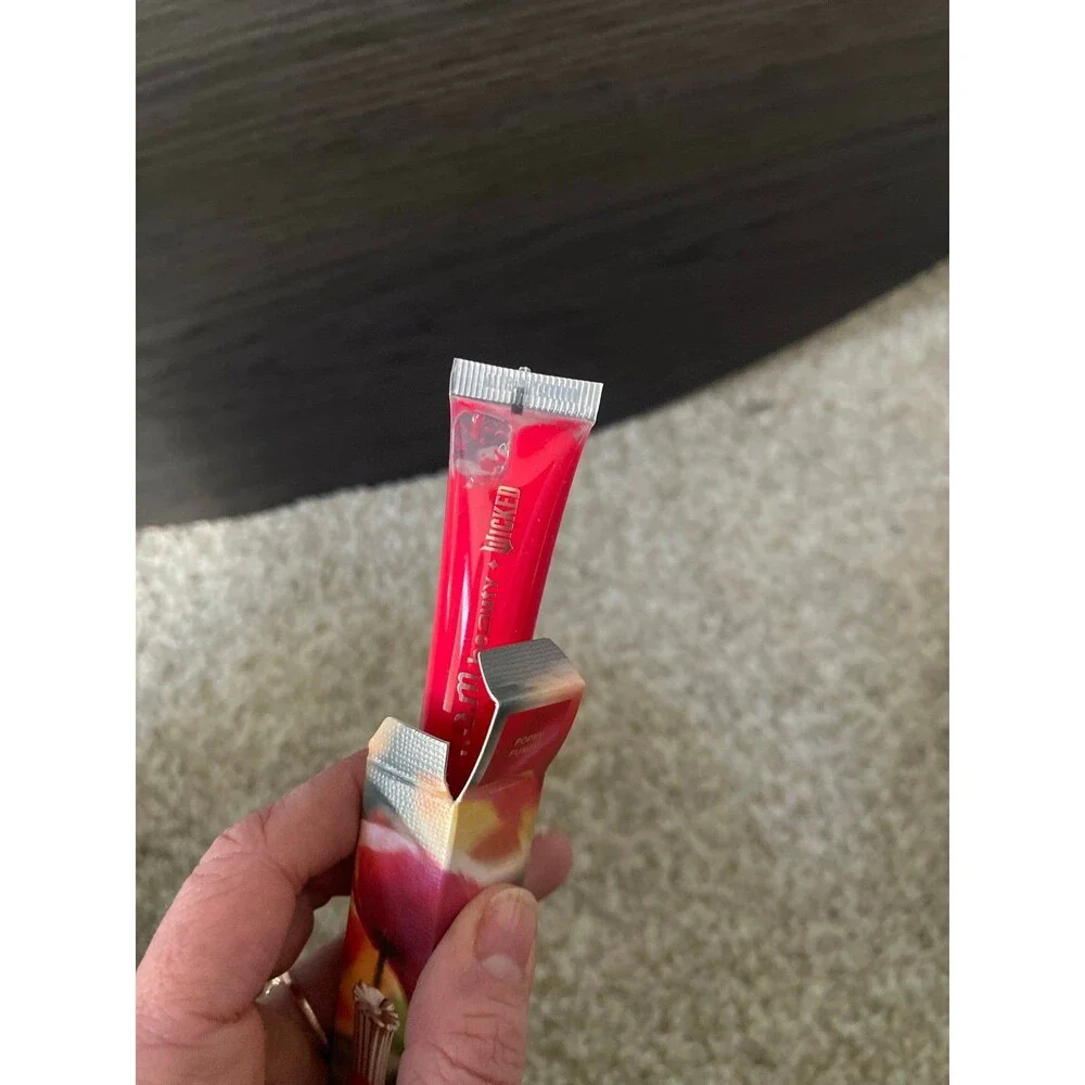 r.e.m. beauty x Wicked: For Good Poppy Plumping Lip Gloss Poppy Punch BNIB